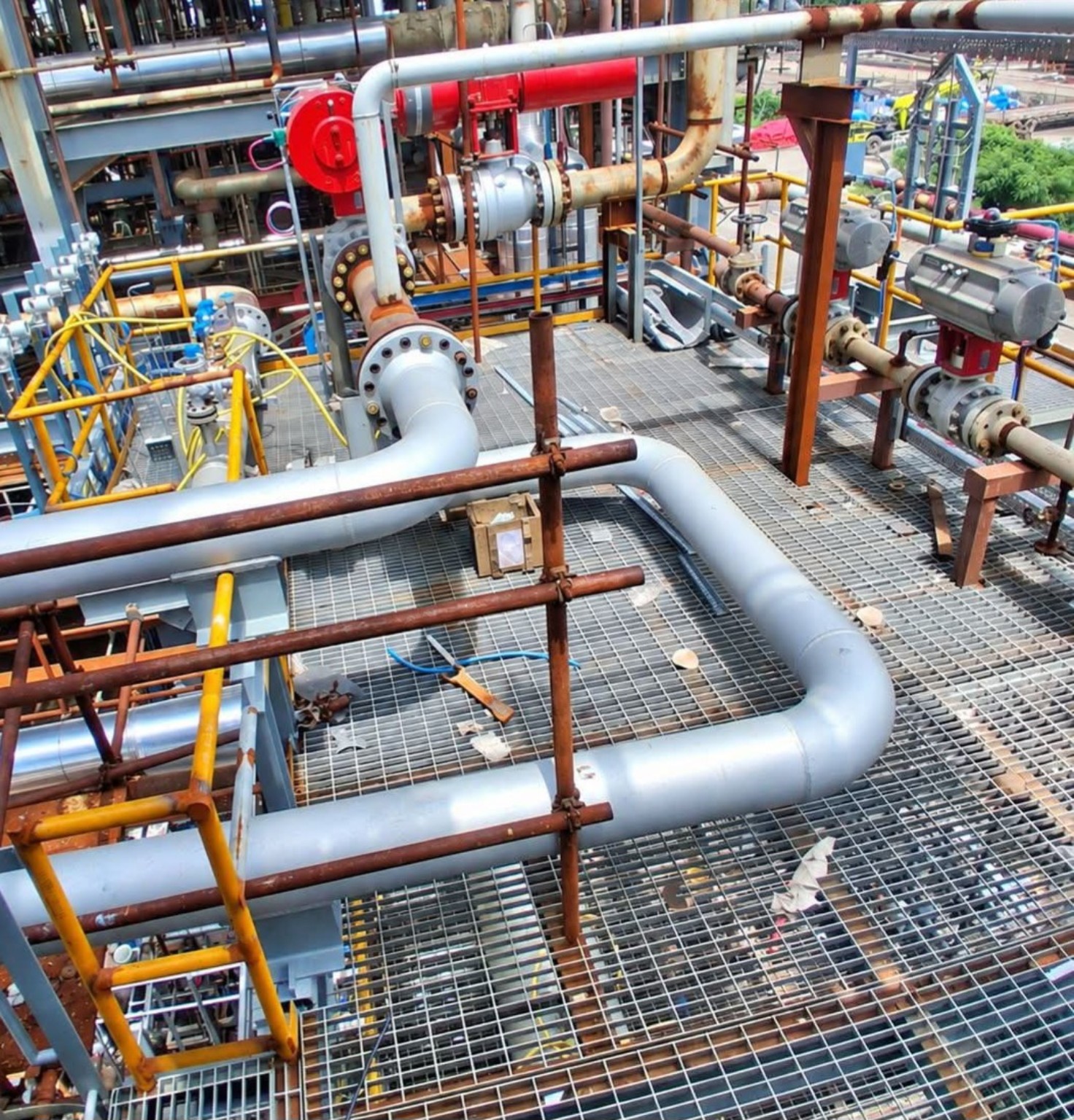 Industrial piping, steel platforms and access walkways
